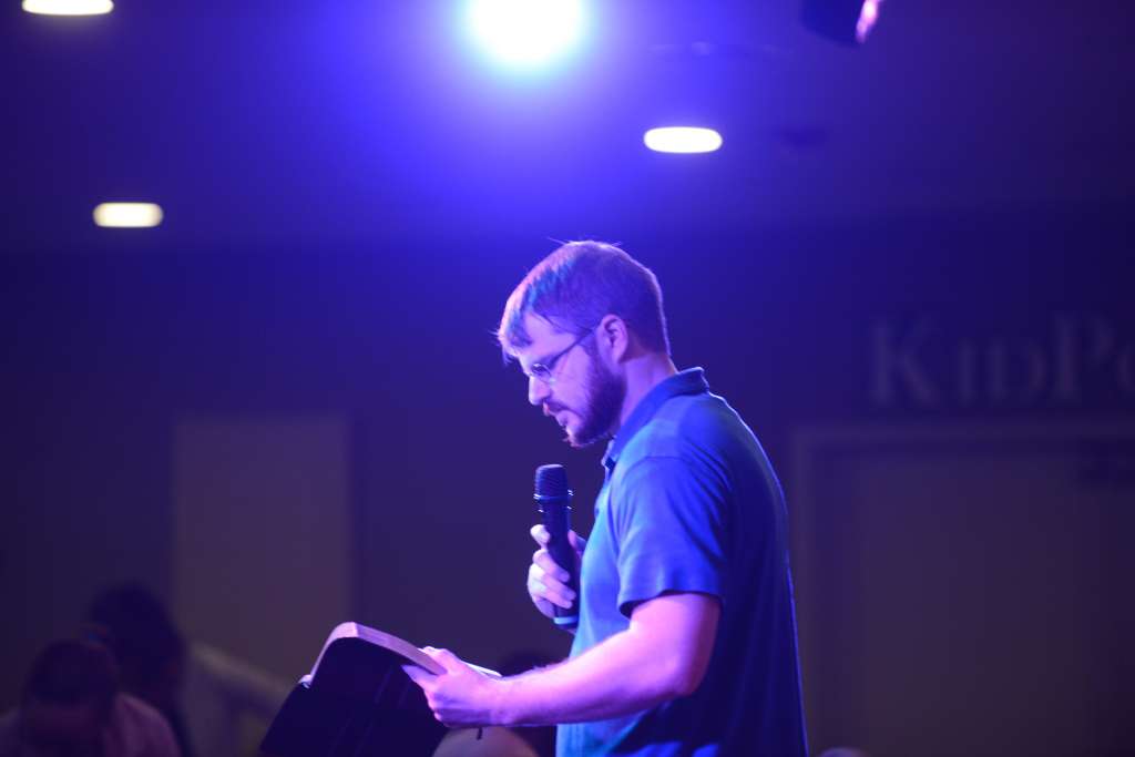 Pastor Michael Kauffman reading the Bible.